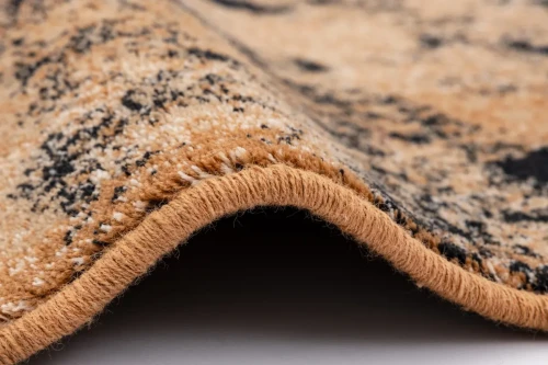 Zbliżenie runa dywanu wełnianego Agnella Isfahan Paulus miedziany