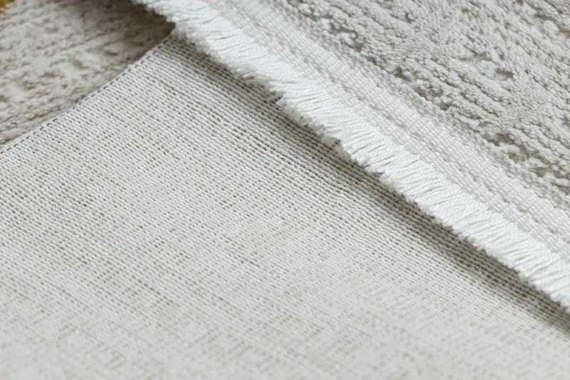 Dywan Duke 51245 kremowo-złoty - frędzle