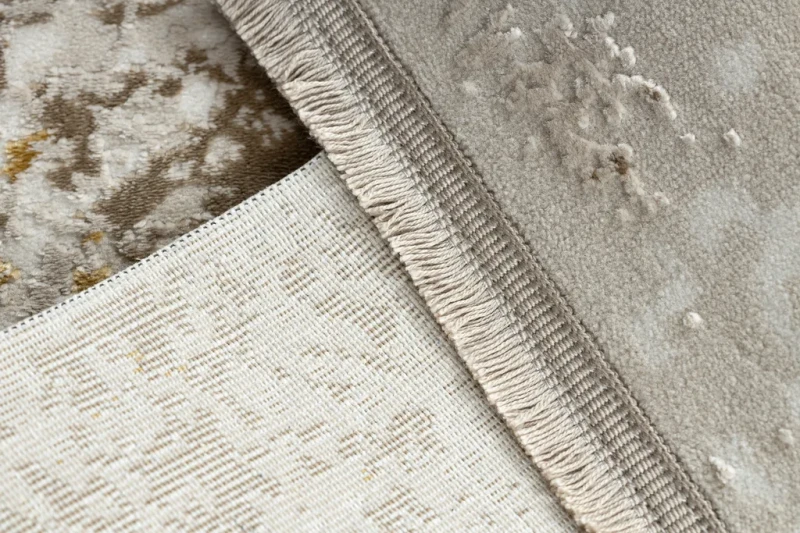 Dywan nowoczesny Duke 51546 beżowo-złoty - frędzle