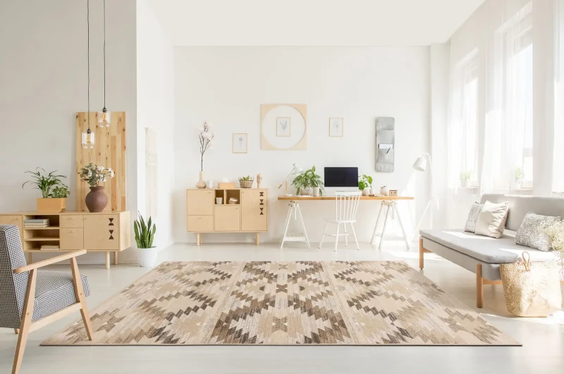 Dywan wełniany etno Agnella Ballata Kazas kolor beżowy w pokoju dziennym w stylu boho