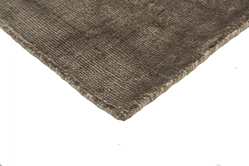Dywan Carpet Decor Handmade Sunset taupe - zbliżenie na róg dywanu z obszyciem