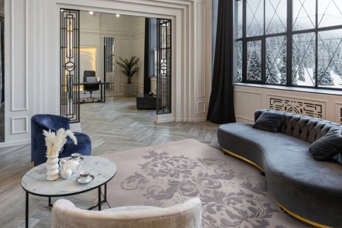 Dywan wełniany Agnella Opal Maryl beżowy (binding) w salonie przy sofie