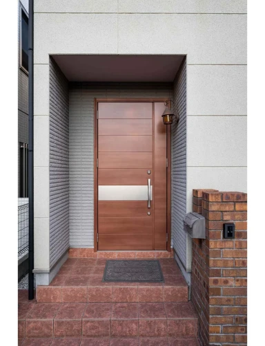 Wycieraczka podgumowana Tivoli Liście szary przed drzwiami