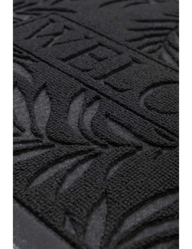 Zbliżenie na wzór 3d wycieraczki podgumowanej Tivoli Liście czarny