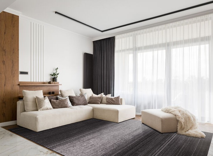 Dywan wełniany Agnella Agnus Maisas grafit w salonie