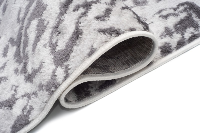 Dywan Sky FM31D w odcieniach szarości z wzorem przekroju pnia - bok