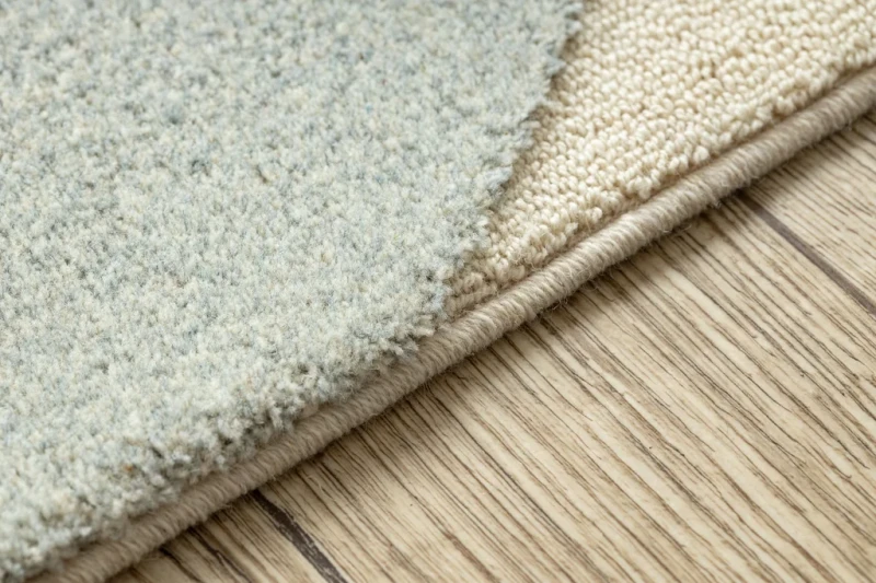 Dywan wełniany Flux 461.10.AE500 niebieski/krem obszycie