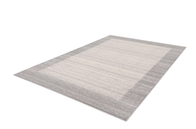 Dywan wełniany Agnella Isfahan M Cyryna jasny szary rzut z boku