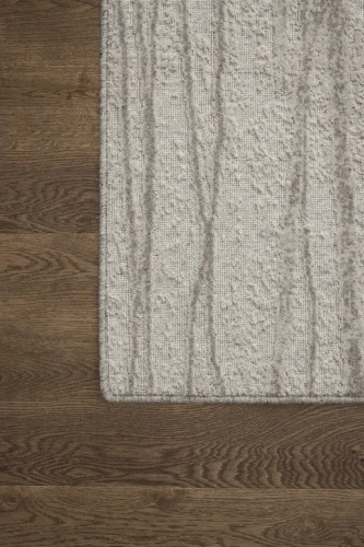 Dywan wełniany Agnella Noble Tejat jasny szary - róg