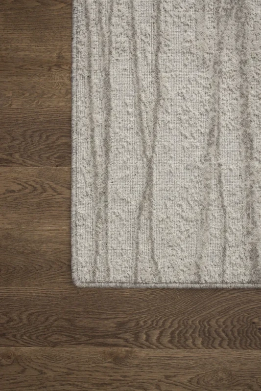 Dywan wełniany Agnella Noble Tejat jasny szary - róg