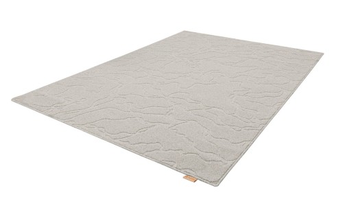 Rzut z boku dywanu wełnianego Agnella Noble Tarion jasny szary