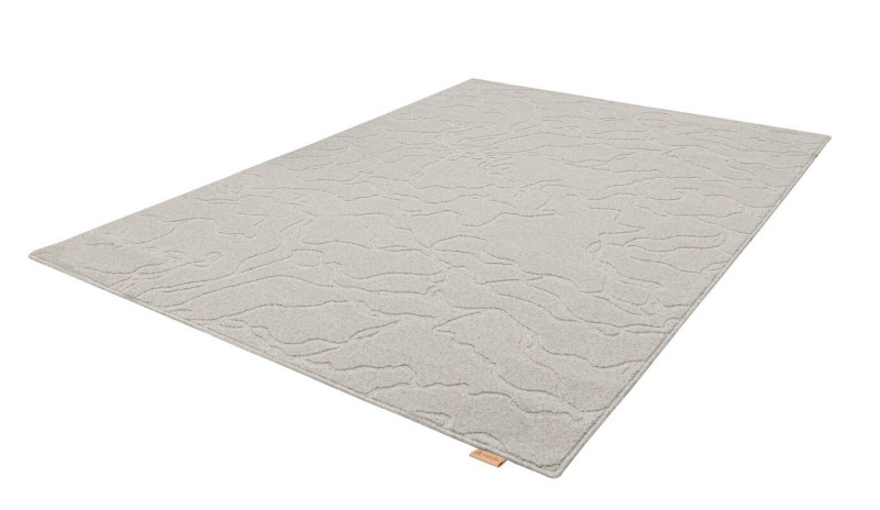 Rzut z boku dywanu wełnianego Agnella Noble Tarion jasny szary