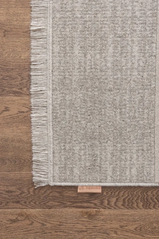 Dywan wełniany Agnella Noble Sullo jasny szary - frędzle