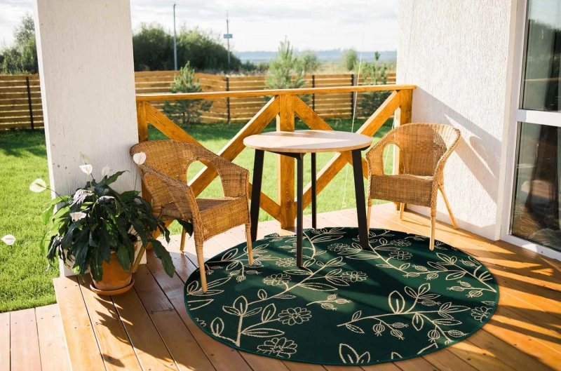 Dywan okrągły zewnętrzny Jungle liście zielony na tarasie