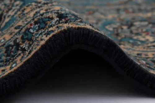 Zbliżenie runa dywanu Agnella Calisia Antonina szmaragd (binding)