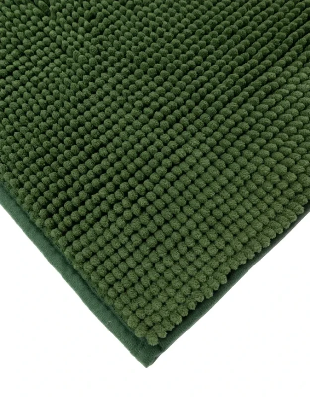 Róg zielonego dywanika łazienkowego Chenille soft