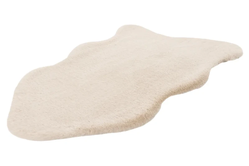 Rzut z boku na beżowy dywan pluszowy Lalee Hides Cosy COS 500