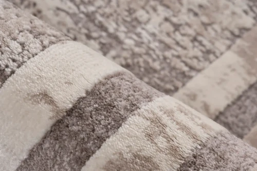 Dwupoziomowe runo dywanu Lalee Pierre Cardin Paris PAR 502 taupe