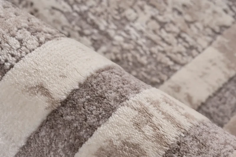 Dwupoziomowe runo dywanu Lalee Pierre Cardin Paris PAR 502 taupe