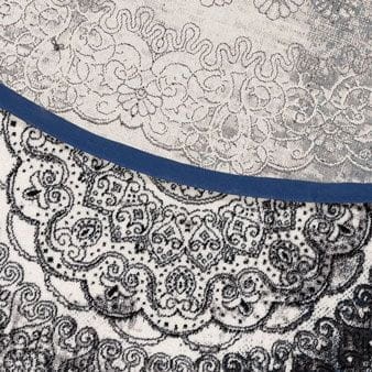 Spód i zakończenie typu binding dywanu Agnella Agnus Currus w kolorze czarnym