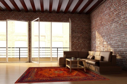 Dywan wełniany Dywilan Omega Mistik czerwony w loftowym wnętrzu