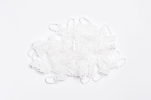 Ślizgi białe z agrafką do szyn/profili aluminiowych