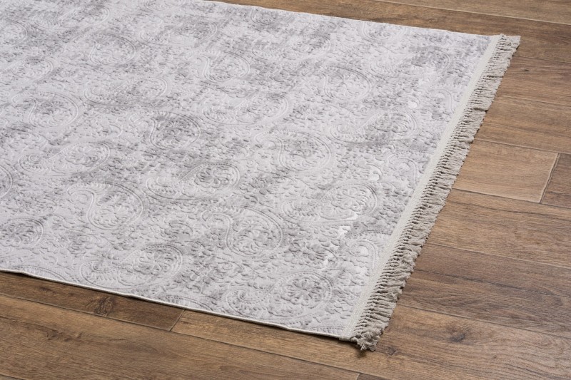 Widok z boku na dywan nowoczesny Avangarde jasny szary