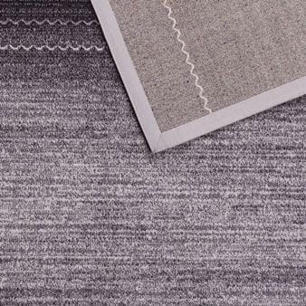 Zbliżenie runa dywanu wełnianego Agnella Agnus Maisas grafit