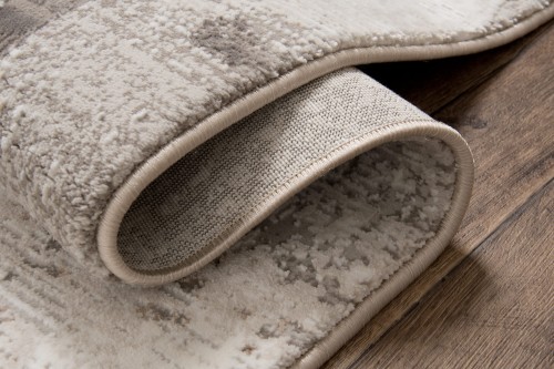 Bok dywanu Exclusive 167 brązowo-złotego