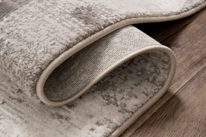 Bok dywanu Exclusive 167 brązowo-złotego