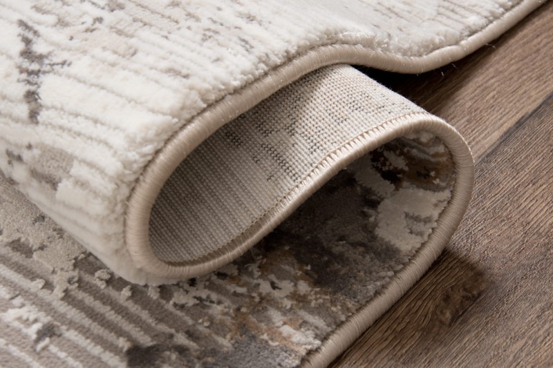 Bok dywanu nowoczesnego Exclusive 193 beżowo-złotego