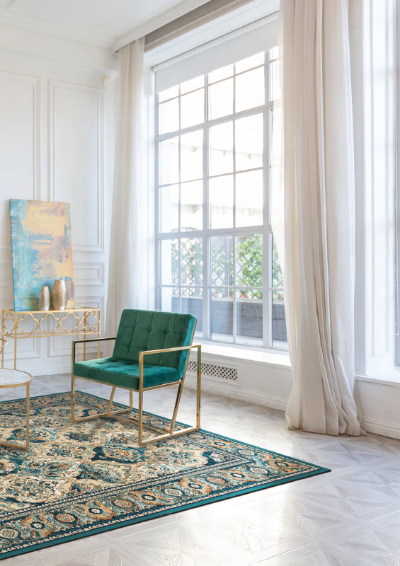 Dywan wełniany Agnella Isfahan Forenza kolor szmaragd w salonie