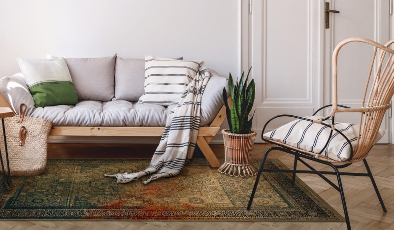 Dywan wełniany Dywilan Omega Mamluk kolor szmaragdowy w salonie w stylu boho