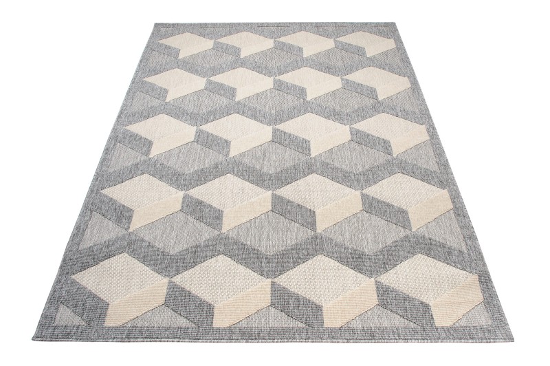 Rzut ukośny szaro-kremowego dywanu 3d geometrycznego Cansas FG40B