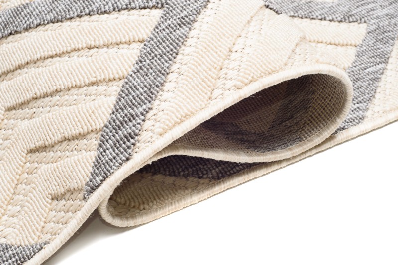 Bok  szaro-kremowego dywanu zewnętrznego 3d Cansas T932C